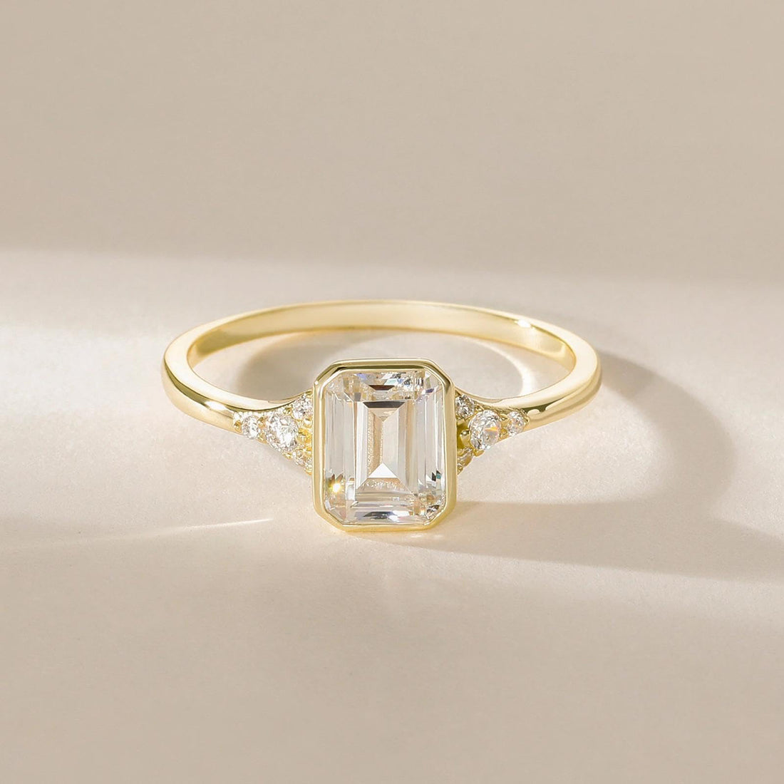 bezel engagement rings, emerald cut engagement rings, emerald cut, emerald diamond, emerald cut diamond ring, emerald cut ring, emerald diamond ring, fake diamond rings, cubic zirconia engagement rings, cubic zirconia wedding rings, silver engagement rings, cz stones, travel rings