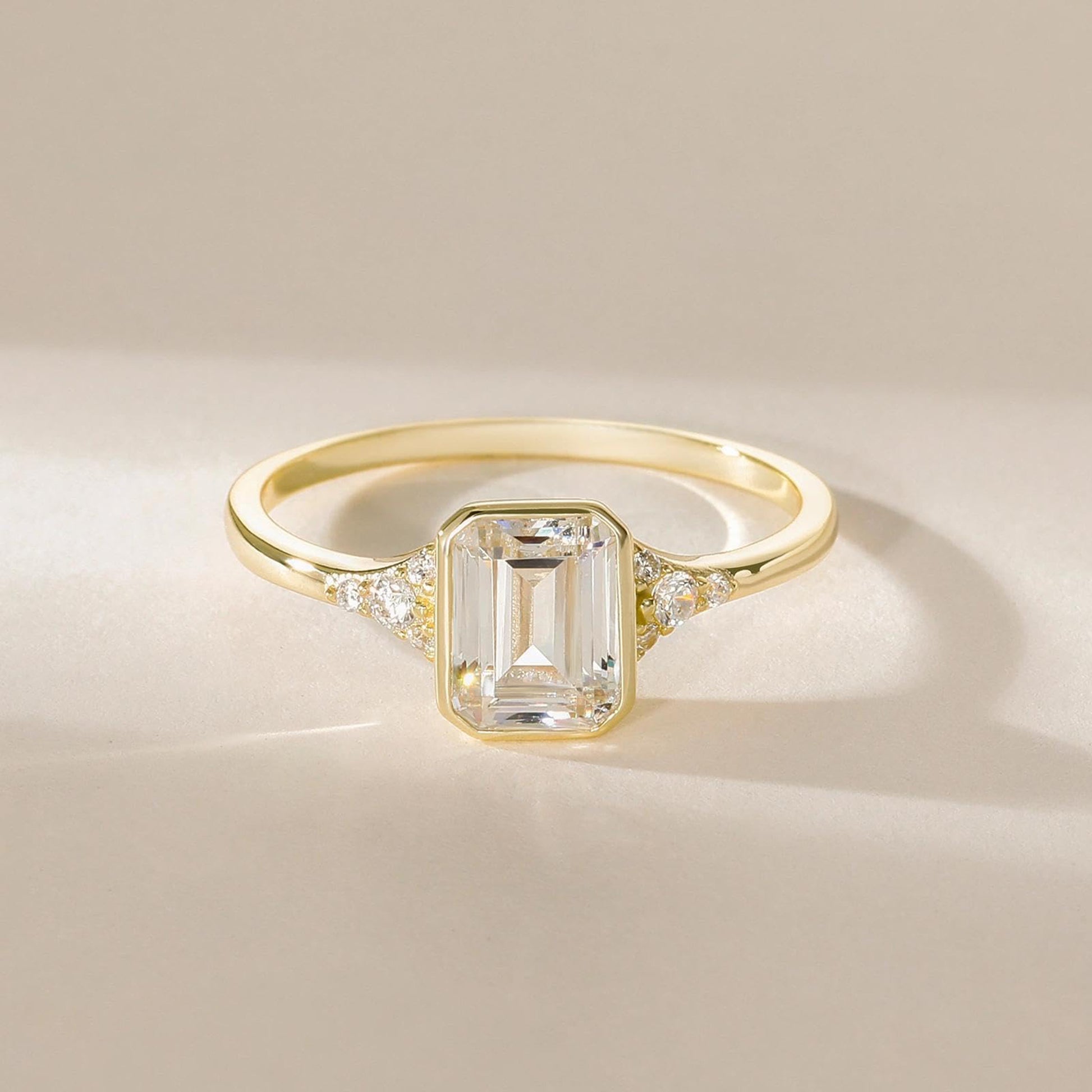 bezel engagement rings, emerald cut engagement rings, emerald cut, emerald diamond, emerald cut diamond ring, emerald cut ring, emerald diamond ring, fake diamond rings, cubic zirconia engagement rings, cubic zirconia wedding rings, silver engagement rings, cz stones, travel rings