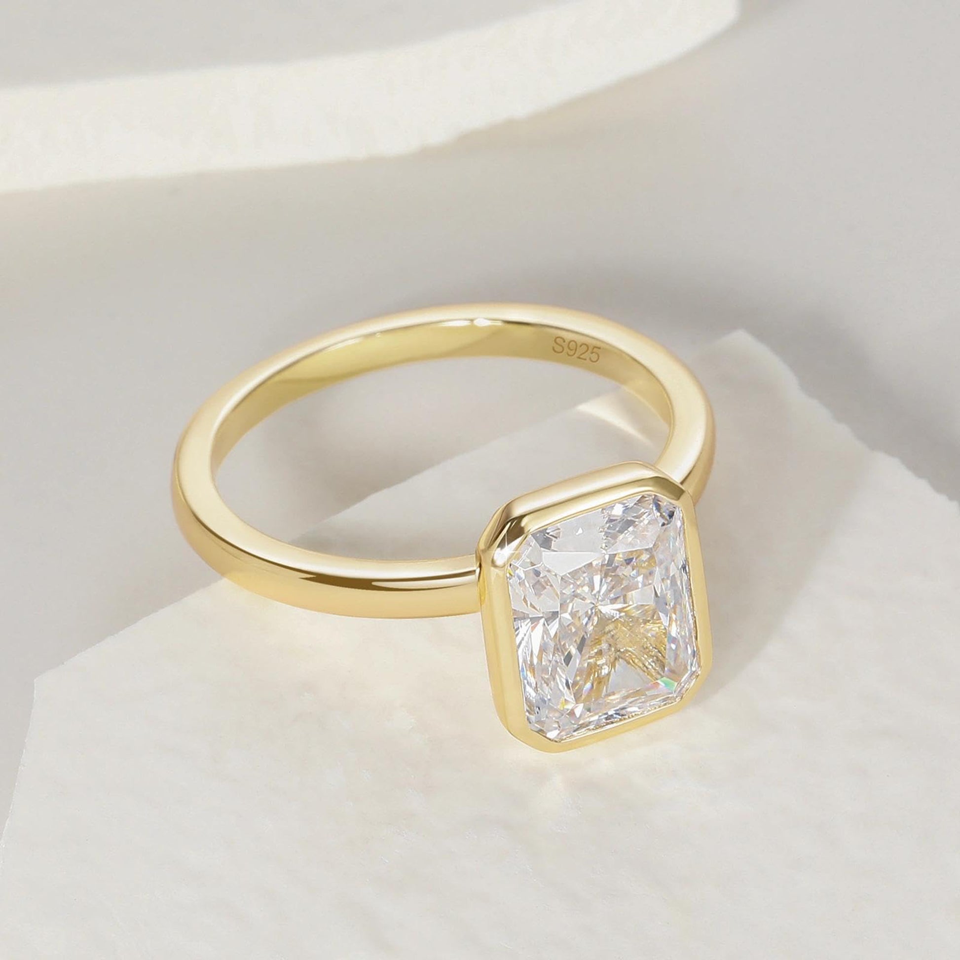 bezel engagement rings, radiant cut engagement rings, radiant cut, radiant diamond, radiant cut diamond ring, radiant cut ring, radiant diamond ring, 1 carat radiant cut diamond ring, cubic zirconia engagement rings, cubic zirconia wedding rings, silver engagement rings, cz stones, travel rings