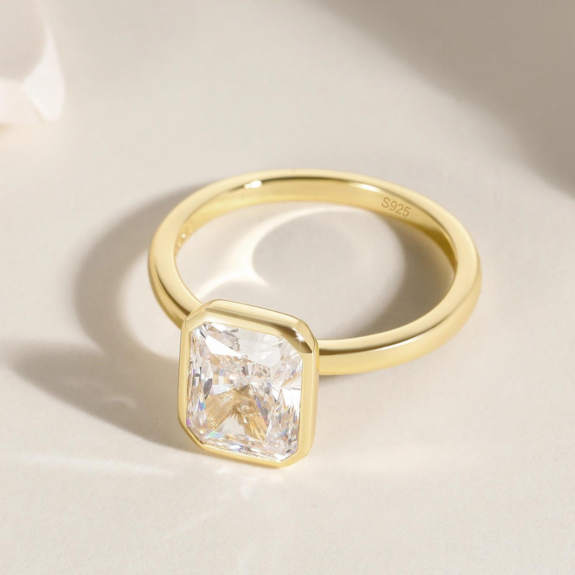 bezel engagement rings, radiant cut engagement rings, radiant cut, radiant diamond, radiant cut diamond ring, radiant cut ring, radiant diamond ring, 1 carat radiant cut diamond ring, cubic zirconia engagement rings, cubic zirconia wedding rings, silver engagement rings, cz stones, travel rings