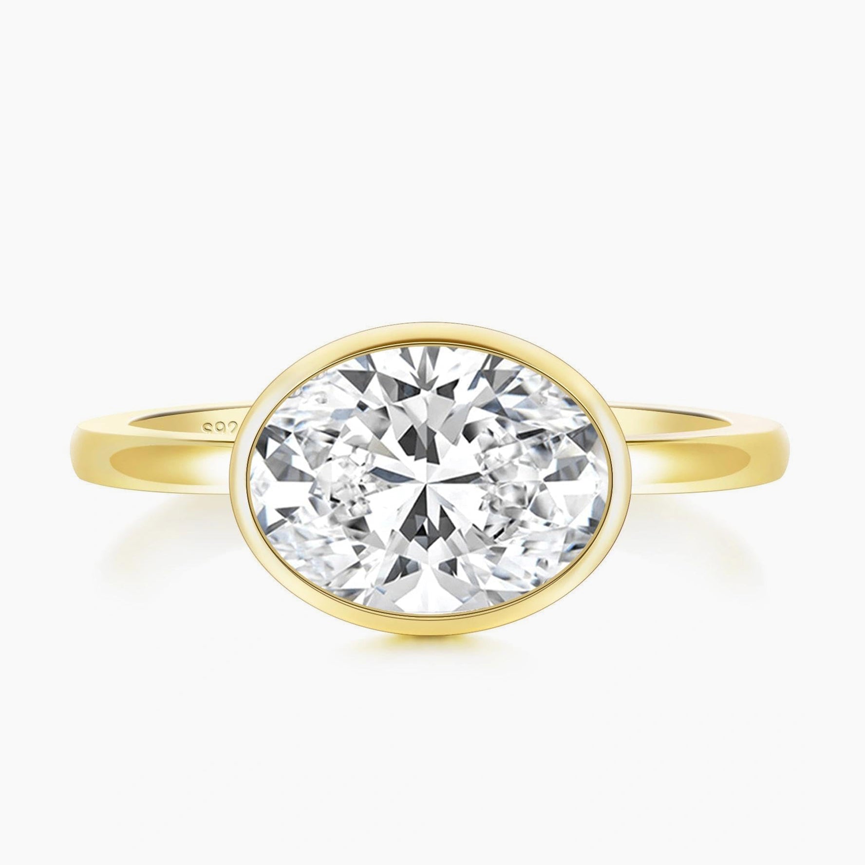 bezel engagement rings, oval engagement rings, cubic zirconia wedding rings, oval zirconia ring, cubic zirconia oval ring, cubic zirconia engagement rings, cubic zirconia wedding rings, travel rings, fake diamond rings