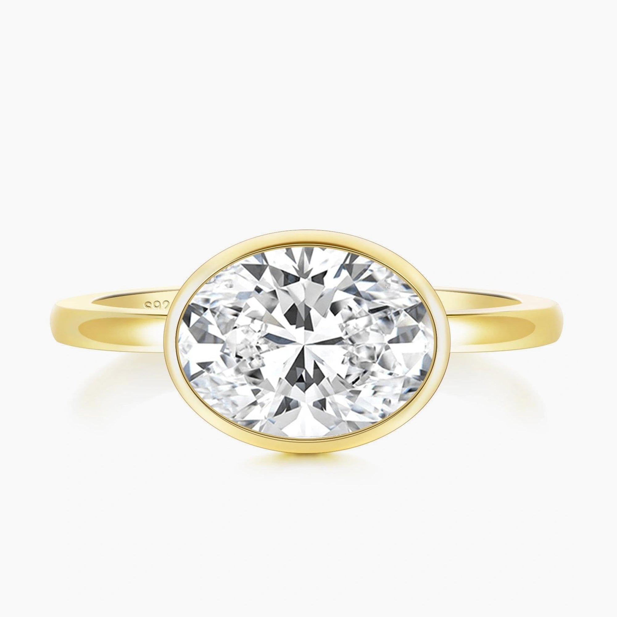 bezel engagement rings, oval engagement rings, cubic zirconia wedding rings, oval zirconia ring, cubic zirconia oval ring, cubic zirconia engagement rings, cubic zirconia wedding rings, travel rings, fake diamond rings