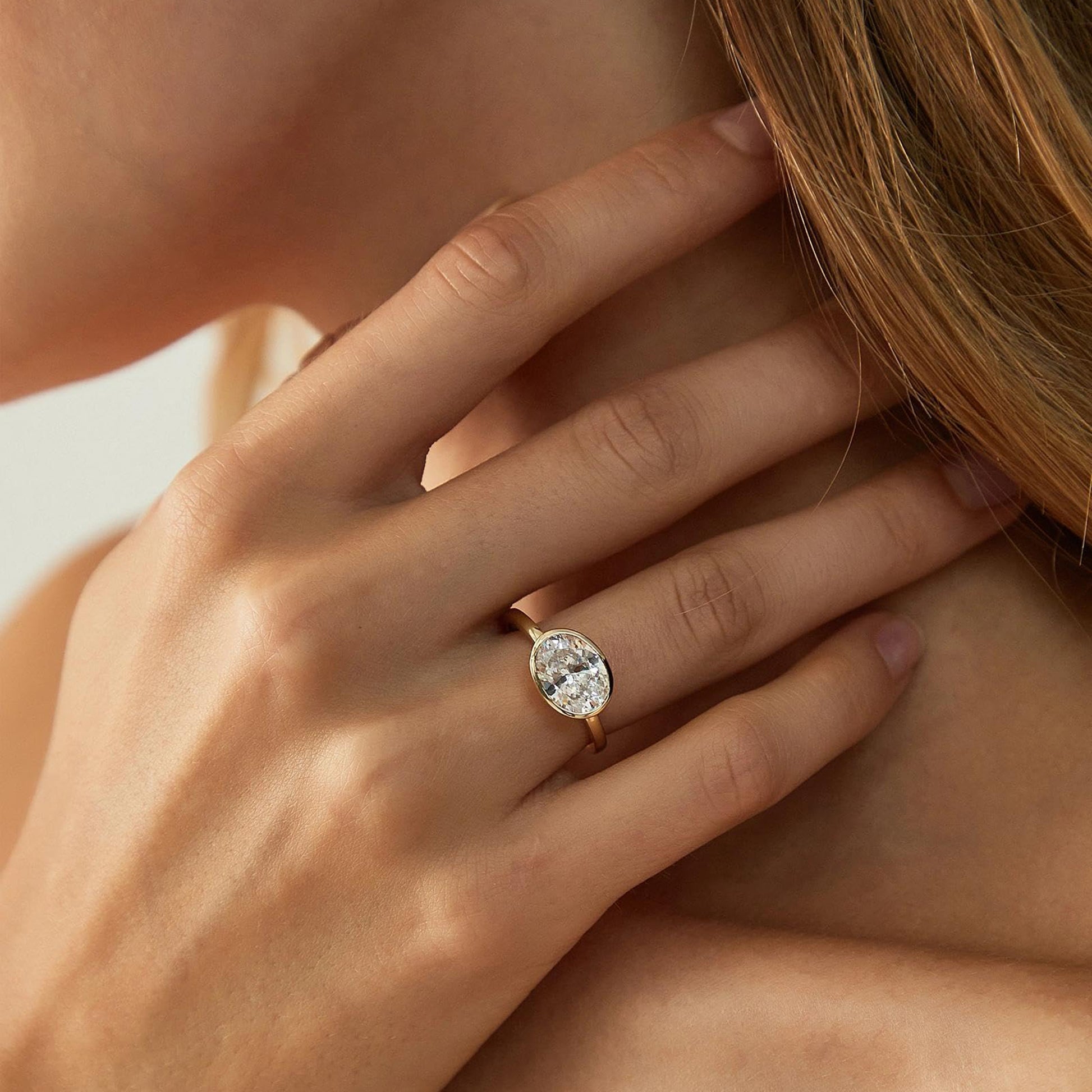 bezel engagement rings, oval engagement rings, cubic zirconia wedding rings, oval zirconia ring, cubic zirconia oval ring, cubic zirconia engagement rings, cubic zirconia wedding rings, travel rings, fake diamond rings, east west engagement rings, affordable jewelry