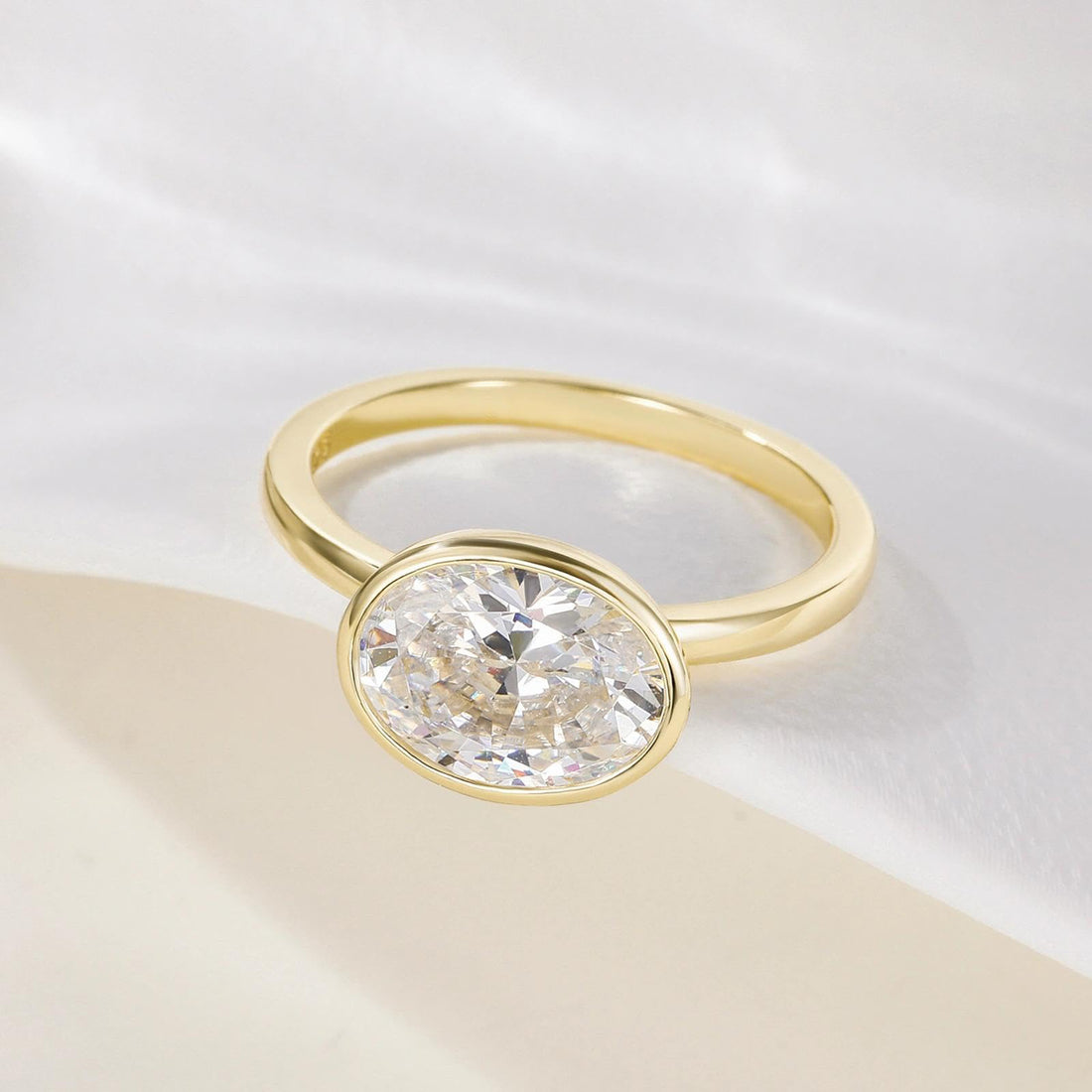 bezel engagement rings, oval engagement rings, cubic zirconia wedding rings, oval zirconia ring, cubic zirconia oval ring, cubic zirconia engagement rings, cubic zirconia wedding rings, travel rings, fake diamond rings