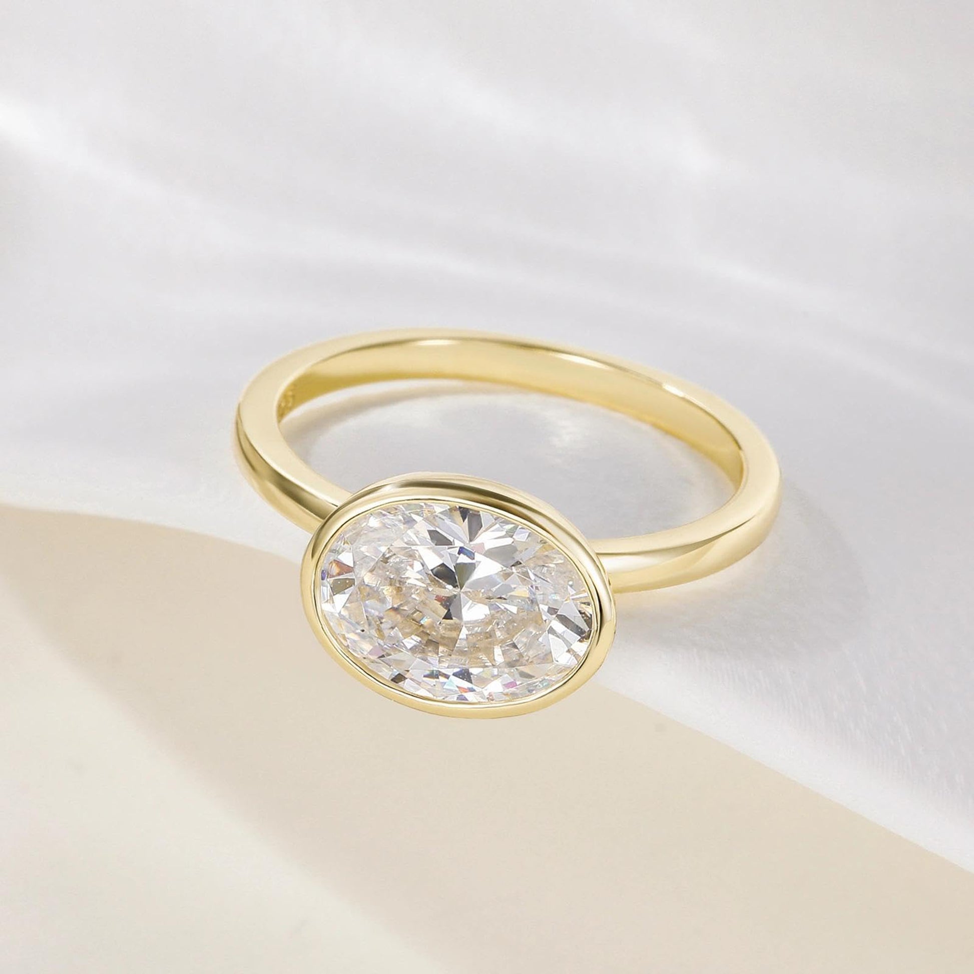 bezel engagement rings, oval engagement rings, cubic zirconia wedding rings, oval zirconia ring, cubic zirconia oval ring, cubic zirconia engagement rings, cubic zirconia wedding rings, travel rings, fake diamond rings