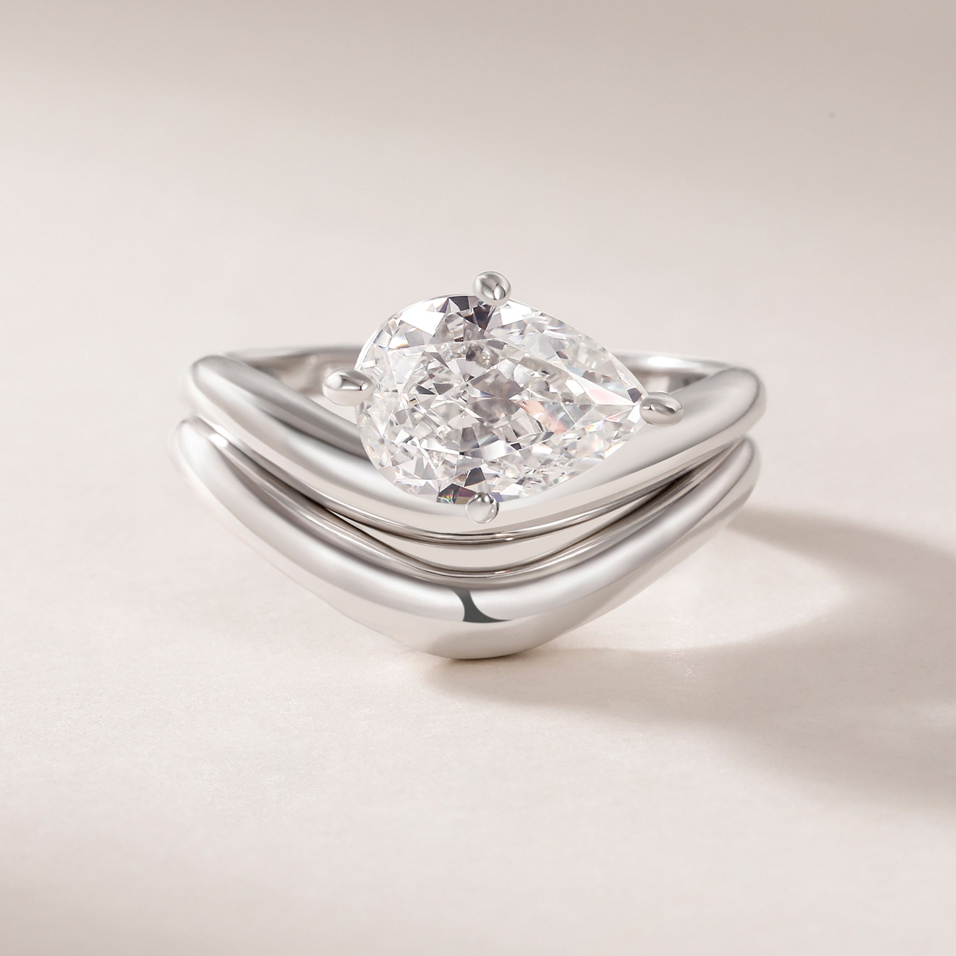 low profile engagement rings, statement rings, engagement ring and wedding band set, cz engagement ring set, cz bridal ring sets, east west pear cut ring, cz bridal ring sets,ring set,thin band engagement ring, eamti, travel ring, eamti jewelry
